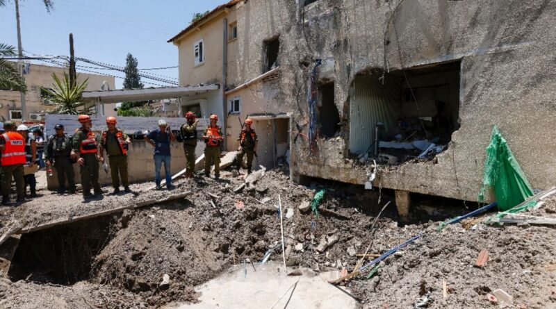 Israeli building hit in wave of drone attacks: rescue services