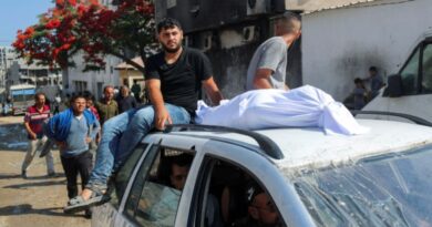 The body of a Palestinian is transported on a car as mourners attend the funeral of Palestinians who were killed, according to medics, in Israeli fire, at Al-Shifa hospital, in Gaza City, June 12, 2025. REUTERS/Mahmoud Issa TPX IMAGES OF THE DAY