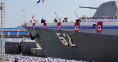 North Korean leader Kim Jong Un waves from on board a warship that had been damaged upon its first attempt to launch, as he and his daughter Kim Ju Ae attend the warship's launching ceremony, in Rajin, North Korea, June 12, 2025 in this photo released by North Korea's official Korean Central News Agency. KCNA via REUTERS ATTENTION EDITORS - THIS IMAGE WAS PROVIDED BY A THIRD PARTY. REUTERS IS UNABLE TO INDEPENDENTLY VERIFY THIS IMAGE. NO THIRD PARTY SALES. SOUTH KOREA OUT. NO COMMERCIAL OR EDITORIAL SALES IN SOUTH KOREA.