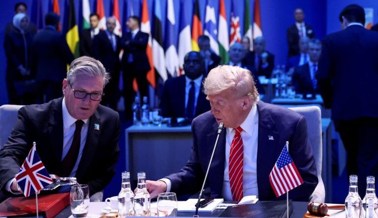 Britain's Prime Minister Keir Starmer and US President Donald Trump attend a meeting of the North Atlantic Council (NAC) during a NATO summit in The Hague, Netherlands June 25, 2025. [Toby Melville/Reuters]