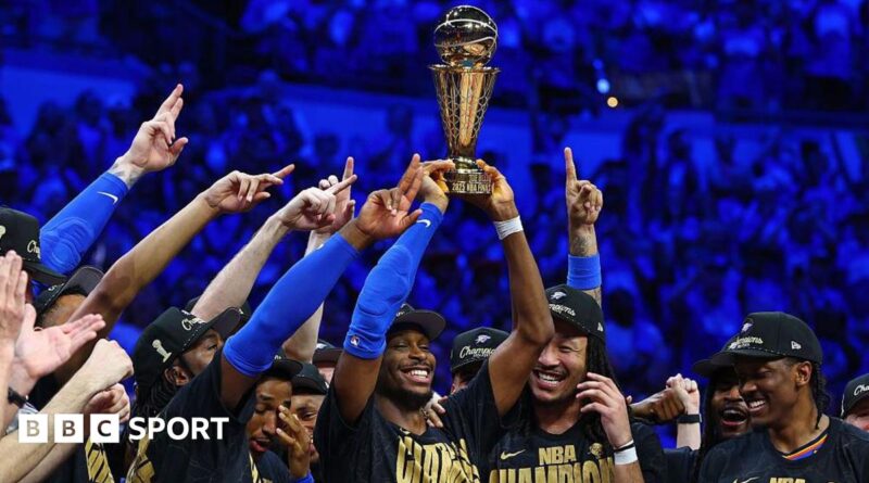 Shai Gilgeous-Alexander and the Oklahoma City Thunder with the NBA Trophy