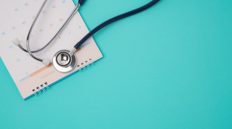 Stethoscope and a calendar. Doctor's appointment and service in the hospital.