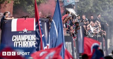PSG's players celebrate their Champions League title with an open top