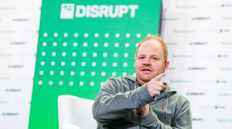 Parker Conrad, CEO at Rippling talks with Mary Ann Azevedo talk about "Going Global" at TechCrunch Disrupt in San Francisco on October 20, 2022. Image Credit: Haje Kamps / TechCrunch