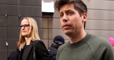 Sam Altman, chief executive officer of OpenAI, right, departs the New York Times DealBook Summit at Jazz at Lincoln Center in New York, US, on Wednesday, Dec. 4, 2024.