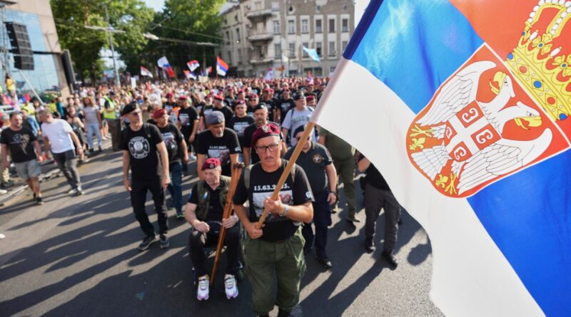 Serbian protesters rally in Belgrade to demand snap election