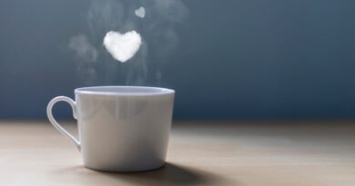 A cup of coffee with a lot of love. Conceptual photography Hearts of smoke come out of a cup of coffee.
