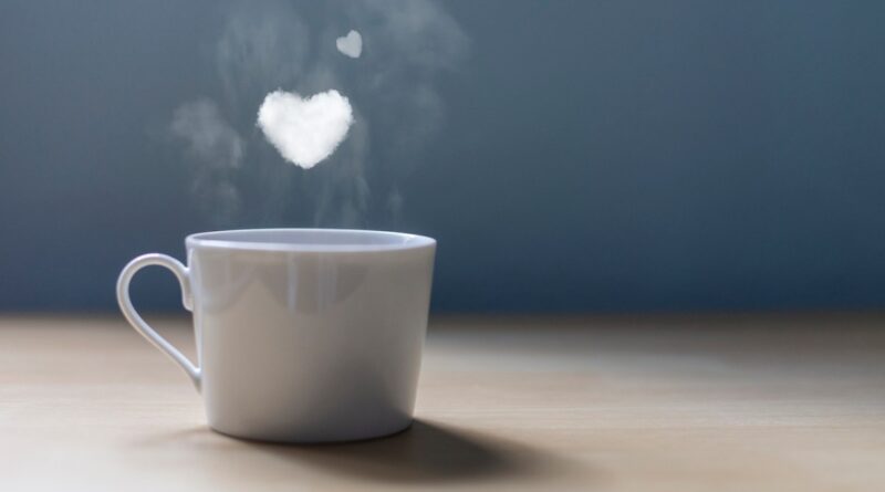 A cup of coffee with a lot of love. Conceptual photography Hearts of smoke come out of a cup of coffee.