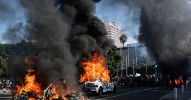 Waymo cars burn during immigration raid protests on June 08, 2025 in Los Angeles, California. Tensions in the city remain high after the Trump administration called in the National Guard against the wishes of city leaders following two days of clashes with police during a series of immigration raids.