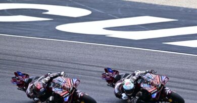 Francesco Bagnaia and Marc Marquez in action.