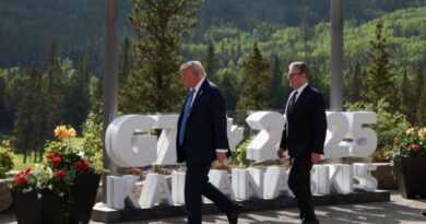 U.S. President Donald Trump and British Prime Minister Keir Starmer walk ahead of a family photo at the G7 Summit in Kananaskis, Alberta, Canada, June 16, 2025. REUTERS/Kevin Lamarque