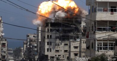 Smoke and flames rise from a residential building hit by an Israeli strike, in Gaza City July 21, 2025. REUTERS/Khamis Al-Rifi TPX IMAGES OF THE DAY