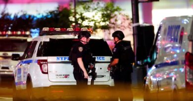 Police officers near the scene of a shooting in the Manhattan borough of New York