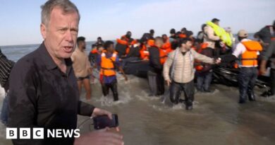 BBC on French beach as police slash migrant 'taxi-boat' heading to UK