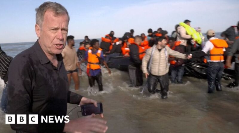 BBC on French beach as police slash migrant 'taxi-boat' heading to UK