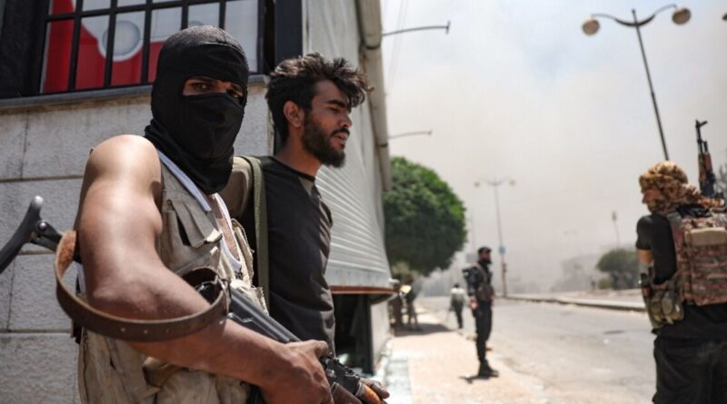 Clashes, homes torched in south Syria's Sweida despite ceasefire