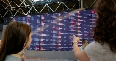 People wait for their flights at the Sheremetyevo International Airport on the outskirts of Moscow on July 28, 2025. A cyberattack on Russia's national airline Aeroflot grounded 42 flights on July 28, officials said, with a Ukrainian and a Belarusian hacker group claiming responsibility for the incident.