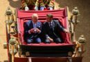 Britain's King Charles and French President Emmanuel Macron sit on a carriage as they arrive at Windsor Castle, in Windsor, Britain, July 8, 2025.