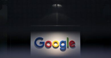 a photo of Google's logo on a dark background