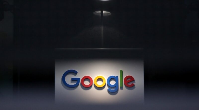 a photo of Google's logo on a dark background
