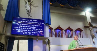 Joy Tajonera celebrates Sunday Mass at Taichung Catholic Church in Taichung, Taiwan, on May 23, 2025 [ Michael Beltran/Al Jazeera]