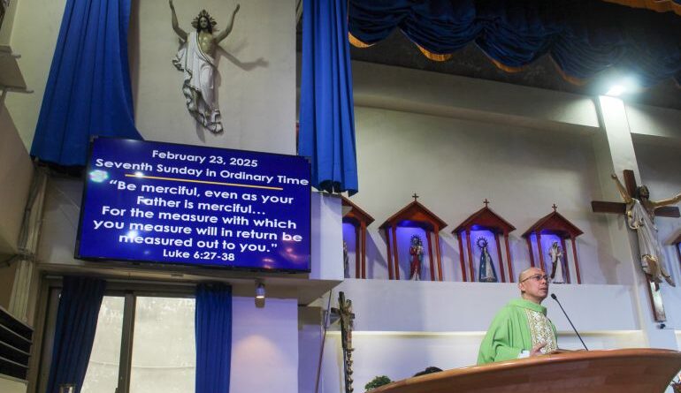 Joy Tajonera celebrates Sunday Mass at Taichung Catholic Church in Taichung, Taiwan, on May 23, 2025 [ Michael Beltran/Al Jazeera]