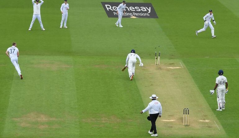 Shubman Gill of India is run out by a direct throw from Gus Atkinson of England (L) during Day One of the 5th Rothesay Test Match between England and India at The Kia Oval