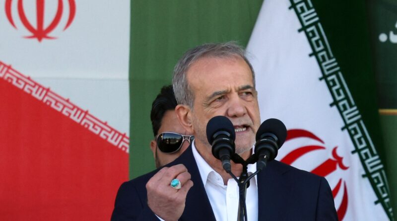 Iran president signs law suspending cooperation with IAEA