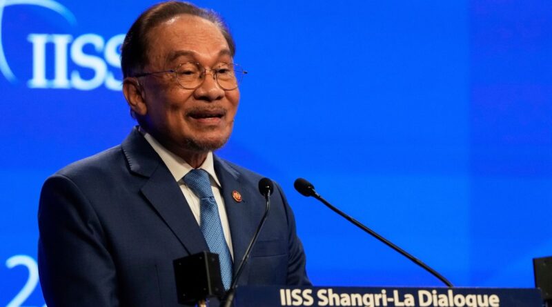 Malaysia’s Anwar announces cash handouts in bid to ease living costs