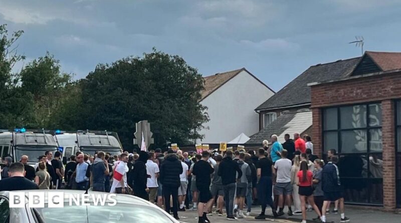 Officers attacked at Epping asylum hotel protest, police say