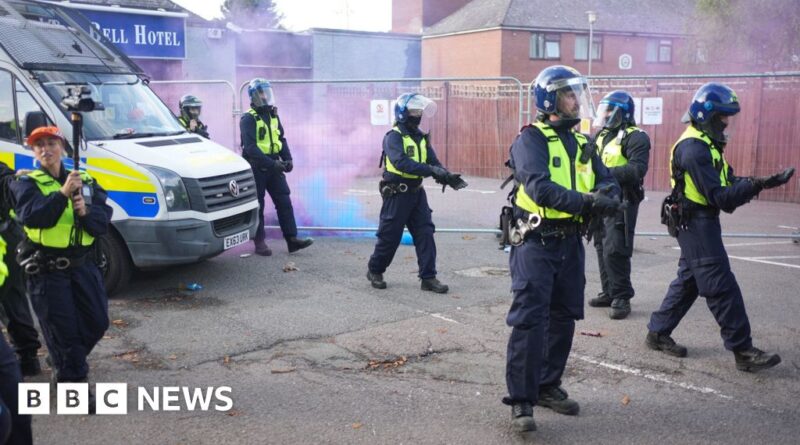 Protesters gather in Epping as bottles and flares are thrown