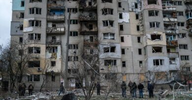 Residents assess the damage to buildings in Kupiansk, in the Kharkiv region of Ukraine. (file photo)