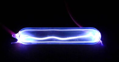 Electricity lights up krypton gas, showing a plasma discharge.