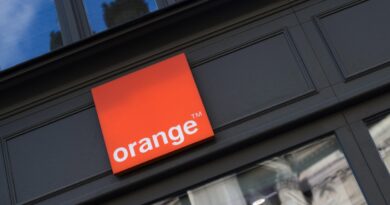 An Orange SA logo sits on display outside the Orange Paris Opera boutique mobile phone store in Paris, France, on Wednesday, July 29, 2020.