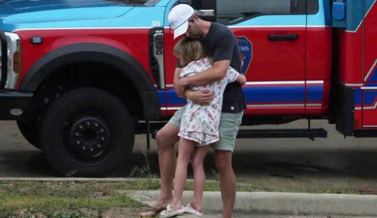 Reunited family members after Texas flash flooding