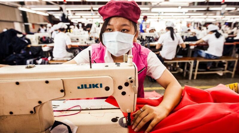 A woman works at a Better Work-affiliated factory in Viet Nam.
