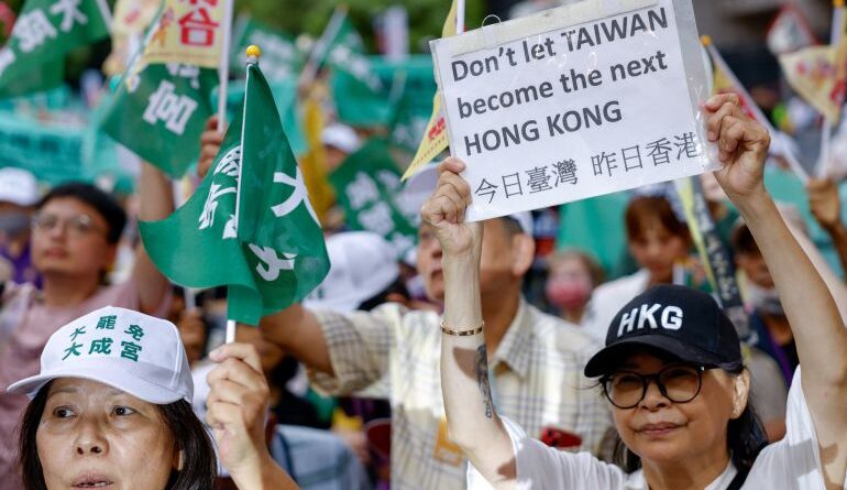 Supporters of the recall movement gather in Taipei, Taiwan July 19, 2025. REUTERS/Ann Wang
