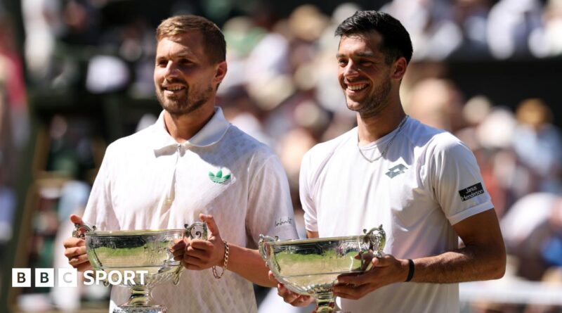 Lloyd Glasspool and Julian Cash after their Wimbledon men's doubles win on Centre Court Wimbledon
