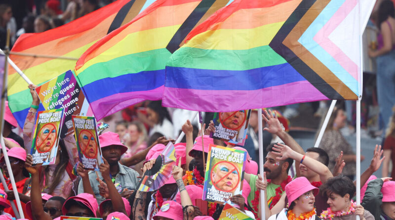 Amsterdam Pride parade blends celebration and protest in LGBTQ+ show of solidarity