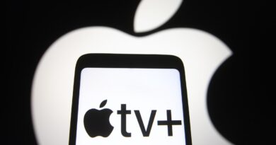 In this photo illustration an Apple TV+ logo is seen on a smartphone screen with an Apple logo in the background.