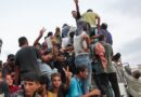 At least 20 Palestinians killed after aid truck overturns in central Gaza
