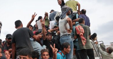 At least 20 Palestinians killed after aid truck overturns in central Gaza
