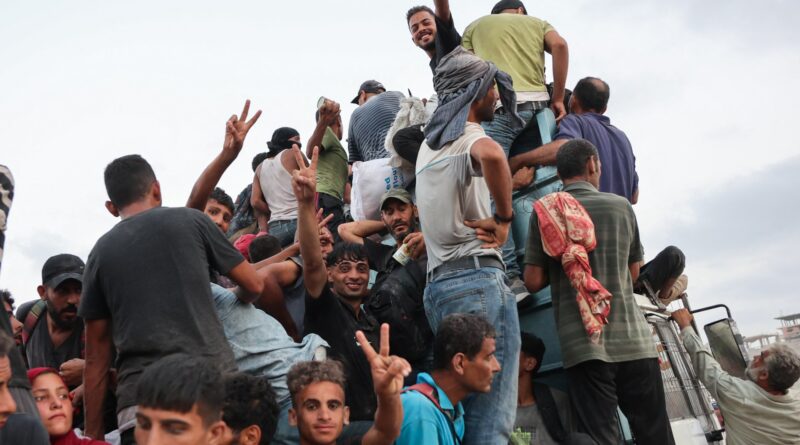 At least 20 Palestinians killed after aid truck overturns in central Gaza