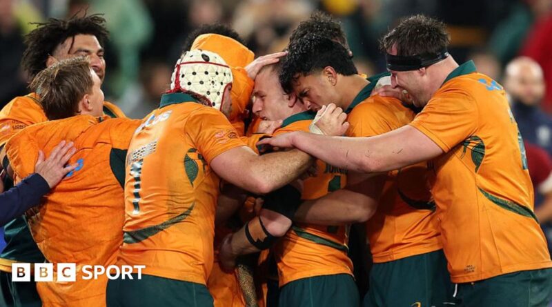Australia congratulate Max Jorgensen for his try