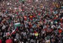 Thousands march across Sydney Harbour Bridge in one of biggest protests in city’s history – video