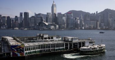 Hong Kong cancels passports, bans financial support for wanted activists