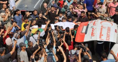 Mourners gather in Gaza for funeral of Al Jazeera staff killed by Israel