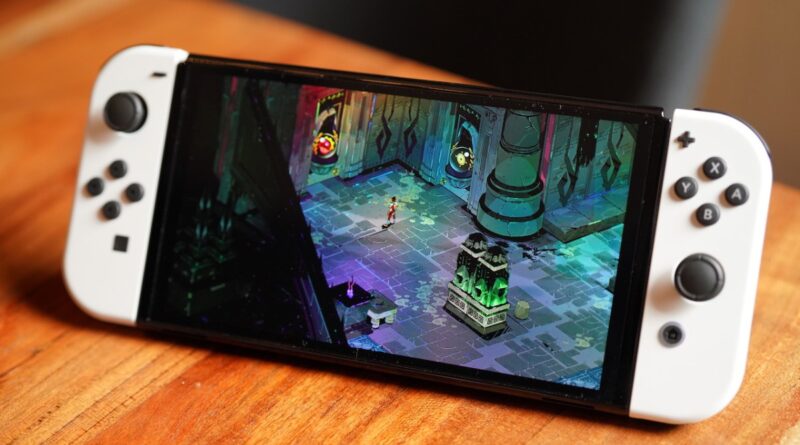 The Nintendo Switch OLED on a table.