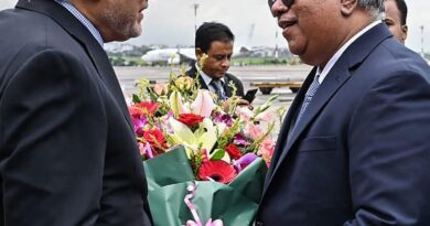 This handout photograph taken and released by Bangladesh's Ministry of Foreign Affairs on August 23, 2025 shows Bangladesh's Foreign Secretary Asad Alam Siam (R) receiving Ishaq Dar (L), Pakistan's Foreign Minister, at the Hazrat Shahjalal International Airport in Dhaka.