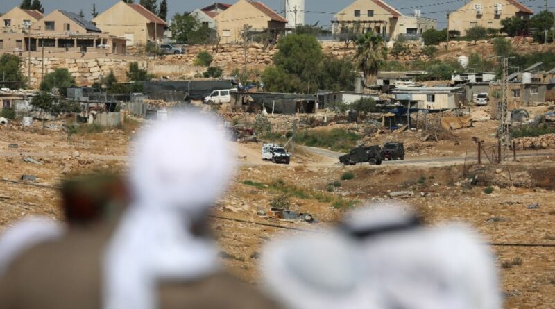 Palestinians bury activist shot dead by West Bank settler